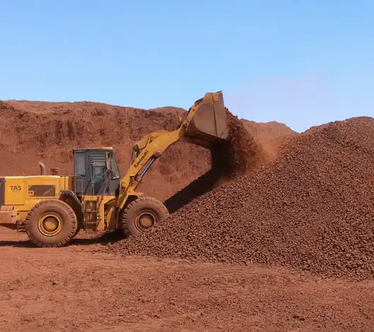 Loader loading Egyptian iron oxide stockpile for bulk supply TAS Flowrance