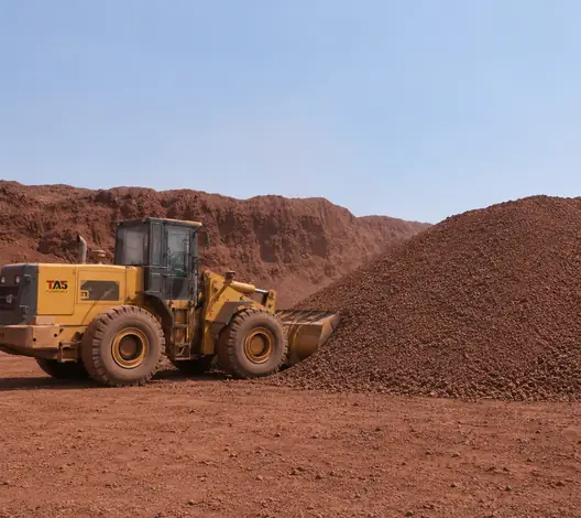 Loader near iron oxide stockpile Egypt TAS Flowrance