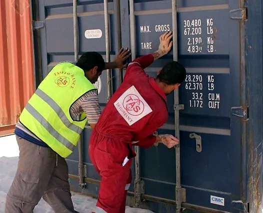 TAS Flowrance Export Container Sealing TAS Flowrance export team sealing a mineral shipment container in Egypt